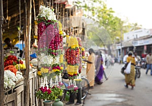 Traditional indian marigold flower garlands in a market place