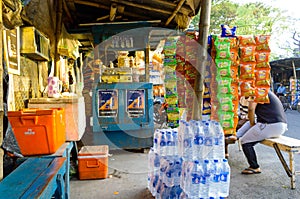 A Traditional Indian packaging Food and Drink Stall market display Water Bottle, Cold drink Bottle, Potato Chip, Packaged drink in