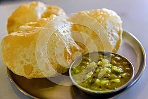 Traditional indian vegeterian meal puri bhaji