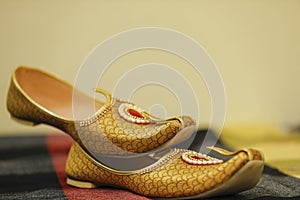 Traditional indian wedding ceremony : Groom wedding shoes or mojadi