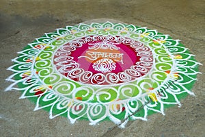 Traditional indian wedding ceremony in Hinduism : Rangoli design for welcome