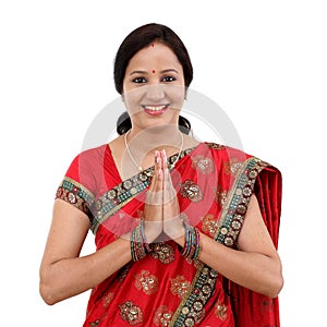 Traditional Indian woman woman greeting Namaste
