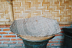 Traditional Indonesian woven wok photo