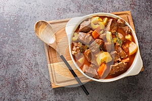 Traditional Irish Stew featuring succulent lamb, sweet root vegetables, and an irresistibly rich broth closeup in the pot.