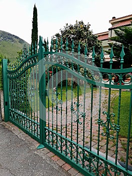 A traditional iron gate of a house entrance