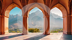 Traditional Islamic arches against a majestic mountain background