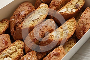 Traditional Italian almond biscuits Cantucci in box, closeup