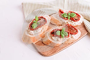 Traditional italian appetizer - bruschetta or toast with ricotta