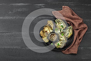 Traditional italian artichoke ÃÂ«alla romanaÃÂ», cooked carciofi vegetable. Olive oil, garlic, parsley photo