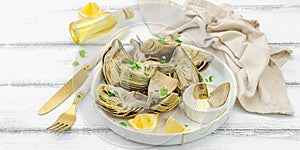 Traditional italian artichoke ÃÂ«alla romanaÃÂ», cooked carciofi vegetable. Olive oil, garlic, parsley photo