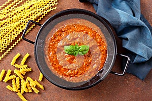 Traditional Italian Bolognese sauce in metal pan