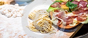 Traditional Italian cuisine. Preparation of Bucatini pasta in Rome, Italy