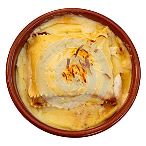 Traditional Italian dish is lasagna baked in oven under cheese crust.