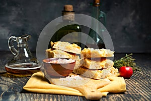 Traditional Italian focaccia bread with salt and olive oil. Homemade flat bread focaccia