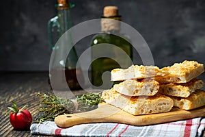 Traditional Italian focaccia bread with salt and olive oil. Homemade flat bread focaccia