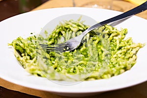 Traditional Italian food - trofie al pesto, typical regional pasta from Liguria region, basil sauce