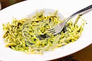 Traditional Italian food - trofie al pesto, typical regional pasta from Liguria region, basil sauce