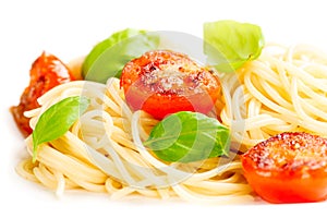 Traditional italian macaroni pasta with grilled tomato and orega