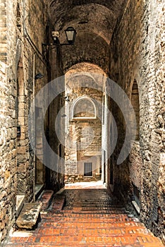 Traditional italian medieval alley and buildings in the historic center of beautiful town of Perugia, in Umbria Region, Italy