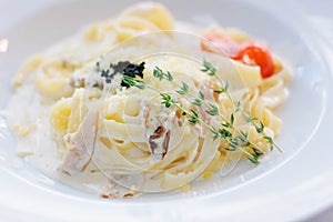 Traditional italian pasta with mushrooms in a restaurant