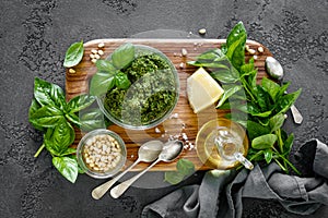 Traditional italian pesto alla genovese with fresh basil leaves, pine nuts, olive oil, garlic and parmesan cheese