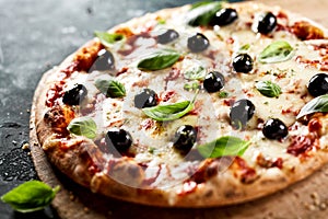 Traditional Italian pizza with black olives