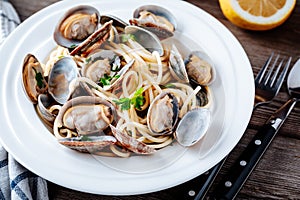 Traditional italian seafood pasta with clams Spaghetti alle Vongole photo