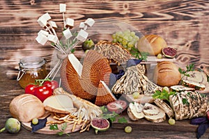 Traditional Italian Smoked cheese, Traditional Polish smoked cheese, Chechil cheese on the Wood background. Smoked cheese  on a