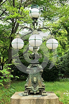 Traditional Japanese Architecture of lamp. 5 light bulbs on the beautiful lion-like base