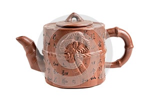 Traditional Japanese clay teapot. Japanese characters on a teapot translated into English mean