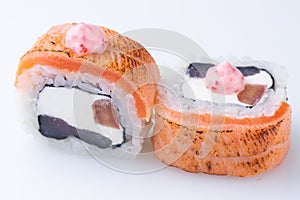 traditional Japanese cuisine. japanese sushi isolated on white background. maki sushi with salmon cucumber soft cheese (