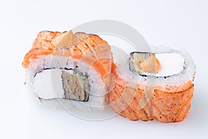 traditional Japanese cuisine. japanese sushi isolated on white background. maki sushi with salmon cucumber soft cheese (