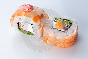 traditional Japanese cuisine. japanese sushi isolated on white background. maki sushi with shrimp cucumber soft cheese (