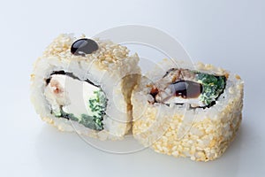 traditional Japanese cuisine. japanese sushi isolated on white background. maki sushi with tuna cucumber soft cheese (