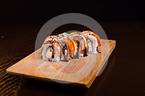 Traditional Japanese cuisine. Sushi restaurant menu. Rolls maki with tuna, eel and avocado