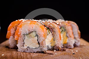 Traditional Japanese cuisine. Sushi restaurant menu. Rolls maki with tuna, eel and avocado