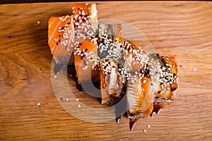 Traditional Japanese cuisine. Sushi restaurant menu. Rolls maki with tuna, eel and avocado