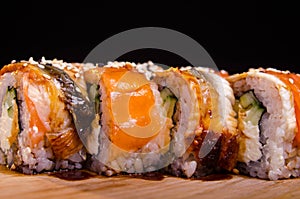 Traditional Japanese cuisine. Sushi restaurant menu. Rolls maki with tuna, eel and avocado