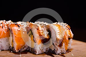 Traditional Japanese cuisine. Sushi restaurant menu. Rolls maki with tuna, eel and avocado