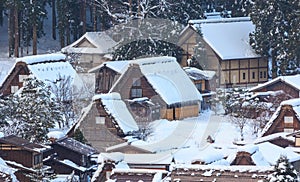 Traditional Japanese gassho houses in small mountain village in snow