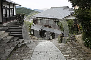 Traditional Japanese houses at Magome Juku town along the Nakasendo trail in Kiso Valley, Japan.