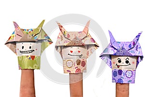 Origami samurai puppets  on white photo