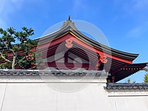 Traditional Japanese roof with blue sky