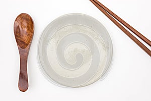 Traditional Japanese wooden chopstick with wooden spoon and whit