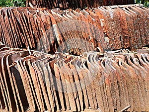 Traditional Javanese roof tile, made from clay that is moulded thinly into a specific shape