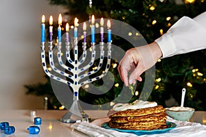 It is traditional Jewish food dish for Hanukkah to eat latkes.