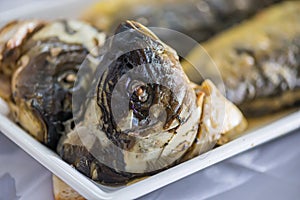 Traditional Jewish Gefilte fish on the plate closeup.