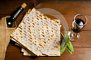 Traditional Jewish kosher matzo for Easter pesah on a wooden tab