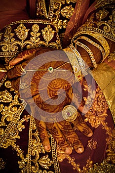 Traditional Kerala Bride Hands With Mehandhi designs and Ornaments