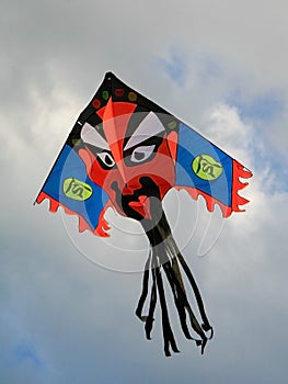 Traditional kite above Tiananmen Square in Beijing photo